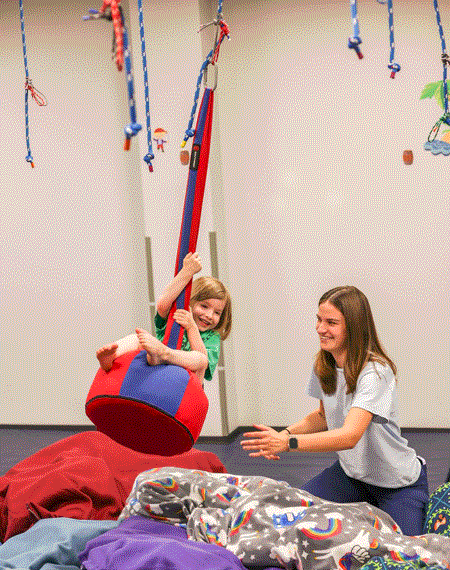 A child participating in a therapy session at South Shore Therapies