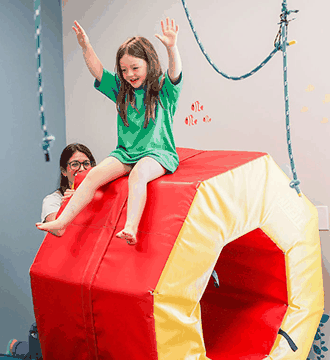 Child engaging in therapy activities at South Shore Therapies 